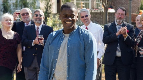 A man being clapped in Get Out movie.