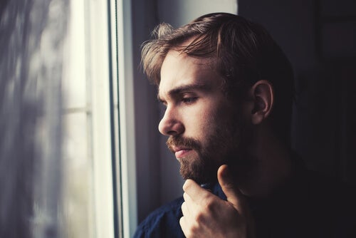 A man thinking about seeking help for his depression.