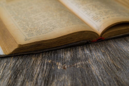 An open book on a table.