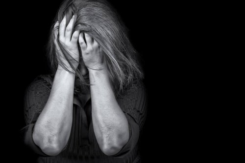 A woman with soldier's syndrome or PTSD.