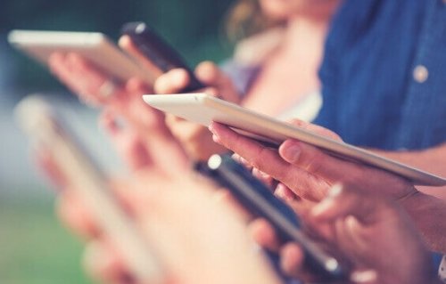 People playing with their phones.