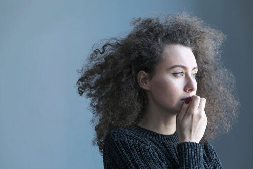 A woman thinking about the psychological perspective on wisdom.