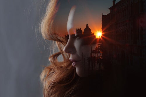 A city reflected in a woman's head.