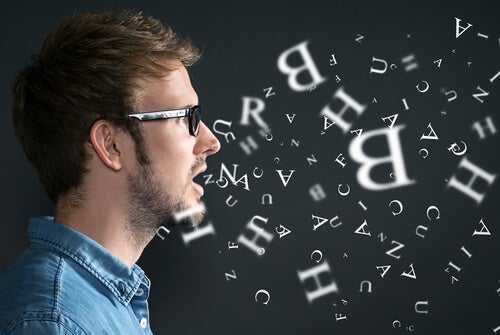A man surrounded by letters.