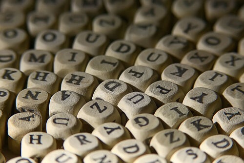 An array of dice with letters.