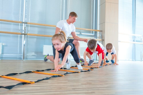 Three children exercising.
