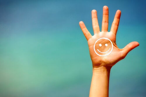 A hand with a smily face.