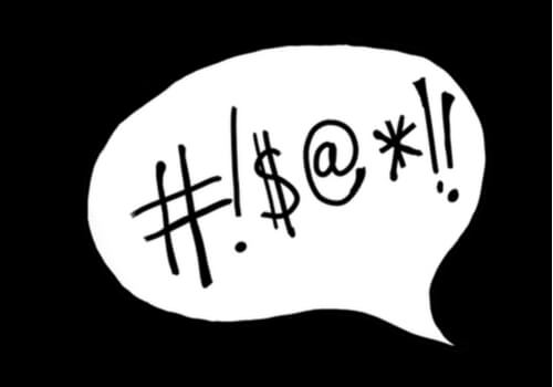 A speech bubble with symbols representing curse words.