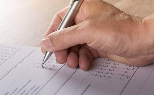 A person carrying out the psychopathology checklist.