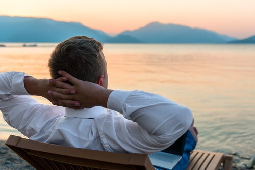 A man contemplating the ocean.