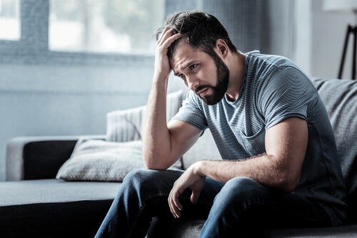 A man worried about fulfilling his New Year's resolutions.
