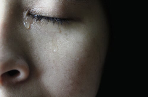 A woman crying.