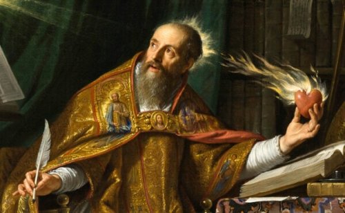 A priest holding a flaming heart.