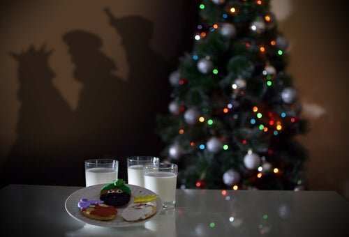 The children leave milk and cookies for Santa.