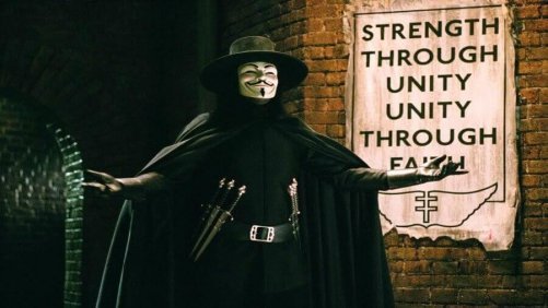V from V for Vendetta walking with arms open.