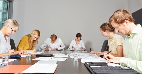 A group of people taking a test.