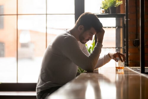 A man drinking.