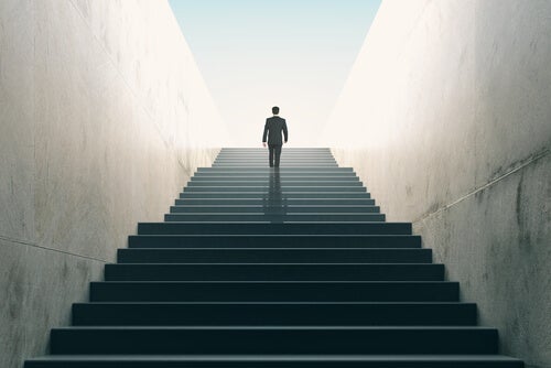 A person going up a staircase.
