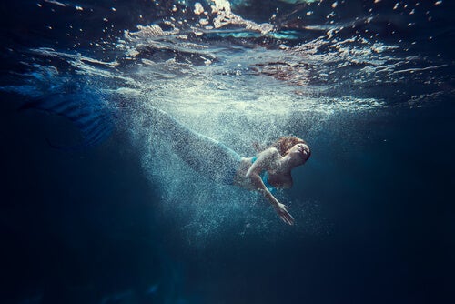 A swimming mermaid.