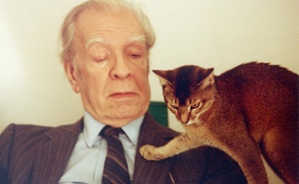 Jorge Luis Borges and his cat.