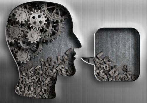 A composition with gears and block letters.