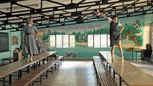 A couple nuns dancing on tables.
