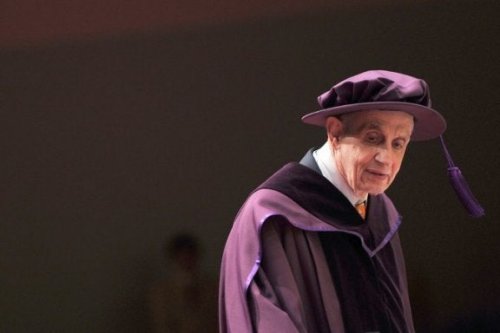 A man receiving the Nobel Prize.