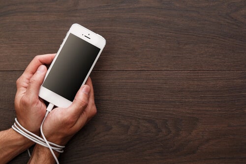 A person tied to their phone.