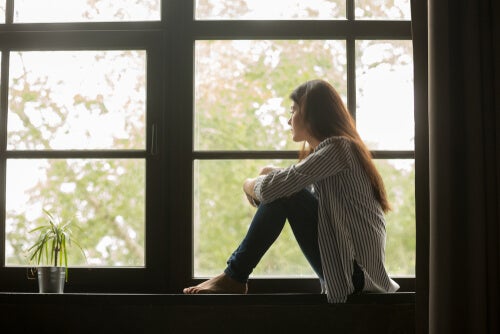 A woman looking out the window.
