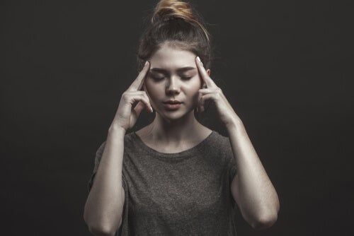 A woman trying to concentrate.