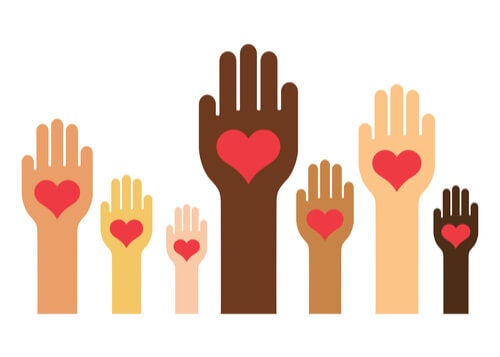 An line of multicolored hands featuring a heart.