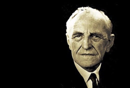 Donald Woods Winnicott with a black background.