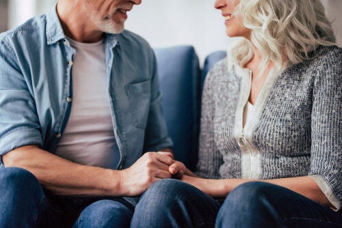 Two people holding hands.