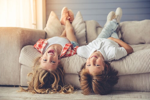 Two children on a sofa.