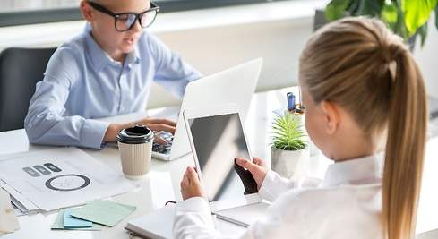 Two children studying.