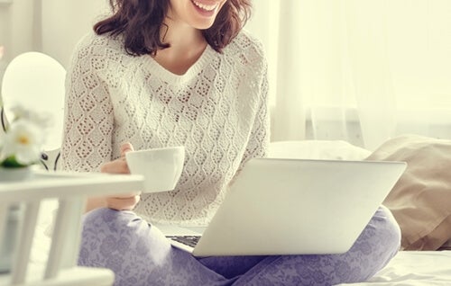 A woman using her laptop.