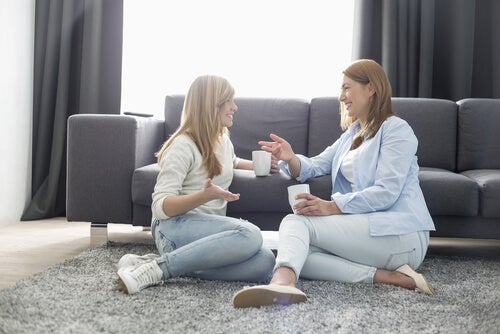 Two women chatting.