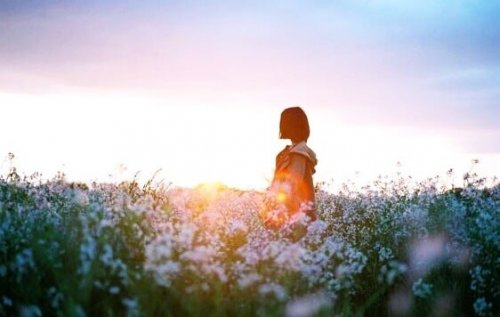 A woman in a flower field.