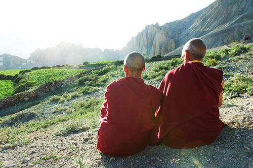 Tibetan monks enjoying the view.