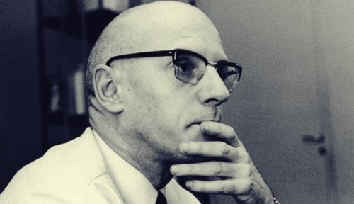 A photo of Michel Foucault thinking about the philosophy of mental illness.