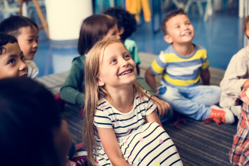 Some smiling children.