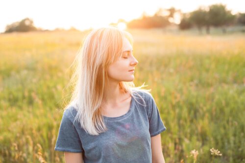 A woman with closed eyes.