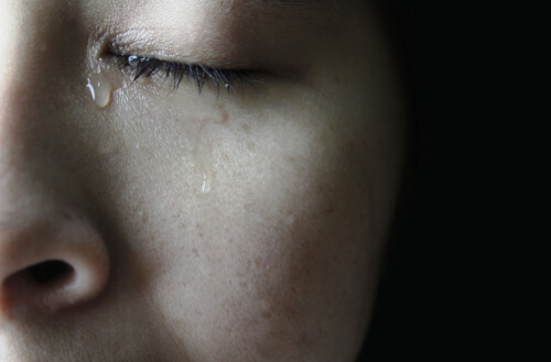 A person crying.