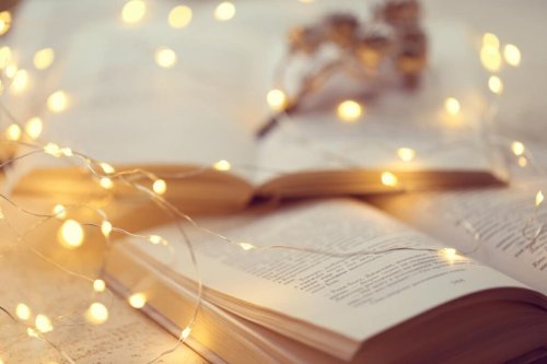 A set of lights over a book.