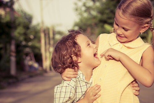 A brother and sister playing.