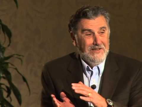 A photo of Elliot Aronson giving a lecture.