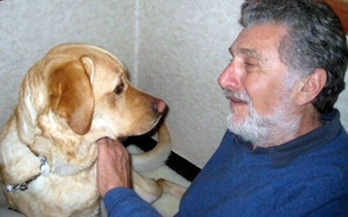 Elliot Aronson with his guide dog.