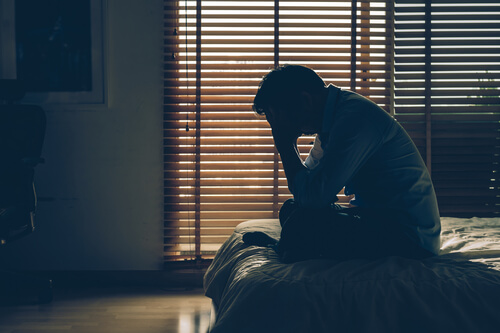 A man feeling stressed out.