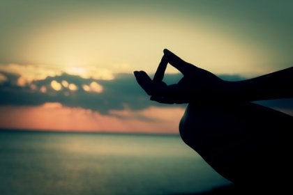A person meditating.