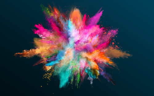 Colorful smoke in a dark background.